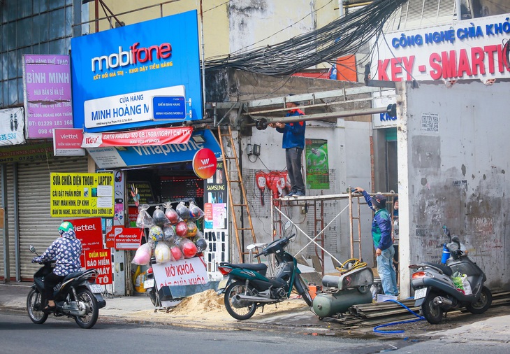 Bà con đường Hoàng Hoa Thám dỡ nhà, giao mặt bằng mở rộng đường vào nhà ga T3- Ảnh 4.