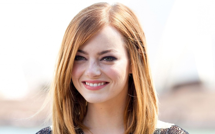 Hình ảnh Emma Stone quen thuộc với đôi mắt to, nụ cười rạng rỡ và dáng vẻ cô gái nhà bên thân thiện - Ảnh: Getty