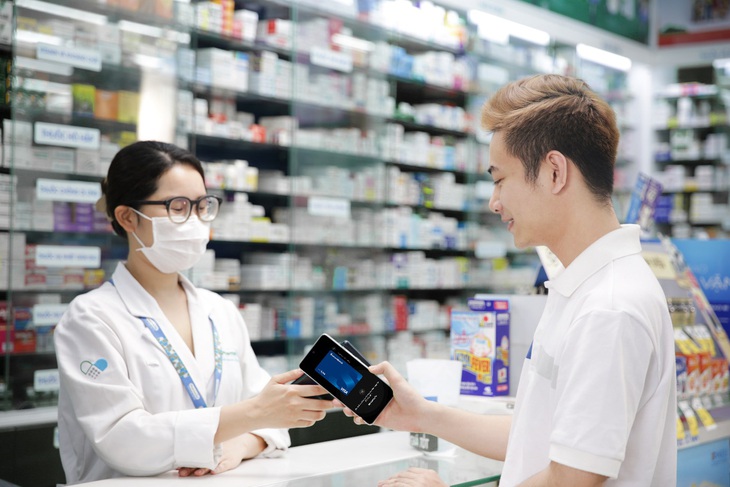 VNPAY SoftPOS giúp tiểu thương ‘nhẹ gánh’ chi phí- Ảnh 1.