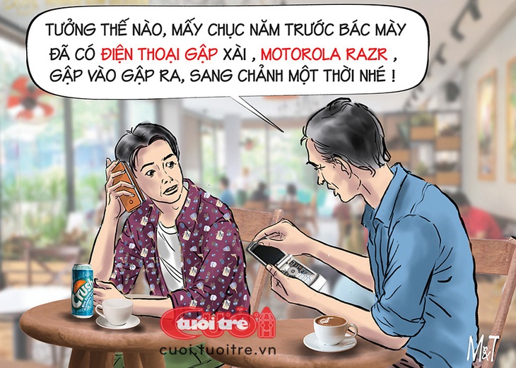 Ông chú sang chảnh dùng điện thoại gập mấy chục năm trước - Ảnh 1.