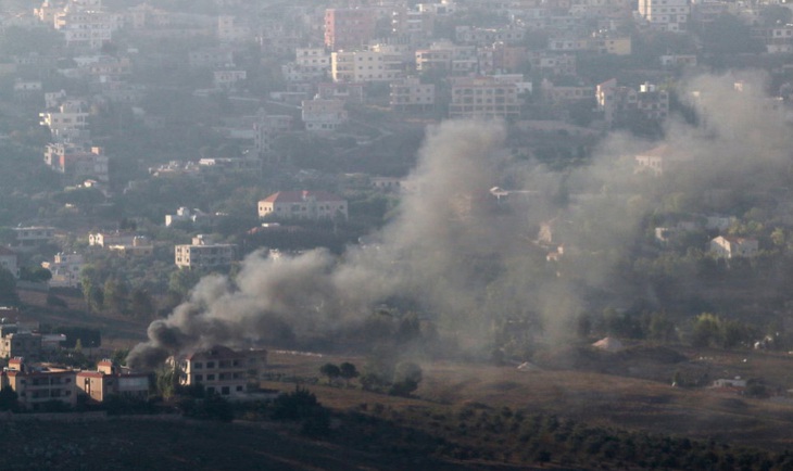 Israel tấn công 'phủ đầu' vào Lebanon, Hezbollah giội loạt rocket và tên lửa - Ảnh 8.