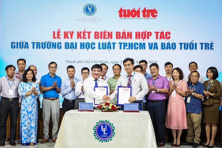 Trường đại học Luật TP.HCM và báo Tuổi Trẻ: Hợp tác để phục vụ cộng đồng - Ảnh 1.