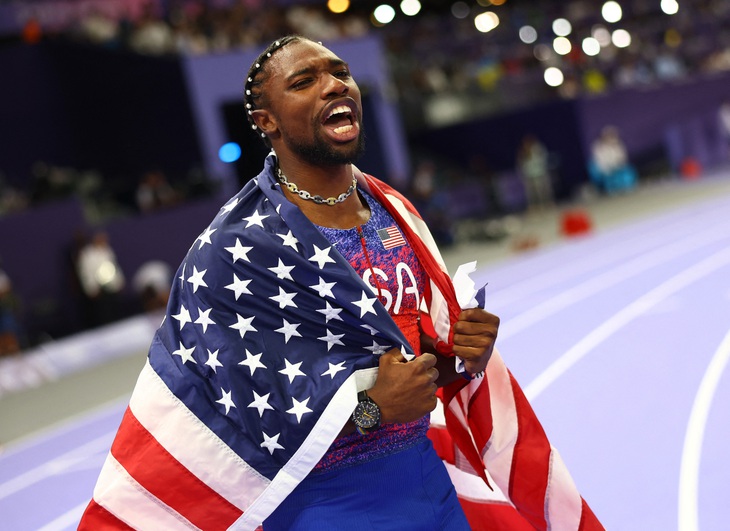 Noah Lyles giành HCV danh giá 100m ở Olympic 2024 - Ảnh: REUTERS