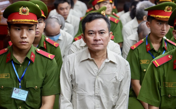 Tuyên án các bị cáo giả mạo trong công tác tại Trung tâm đăng kiểm 84-02D ở Trà Vinh - Ảnh 4.