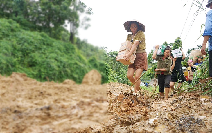 Ấm lòng những suất quà của bạn đọc Tuổi Trẻ đến vùng lũ - Ảnh 1.