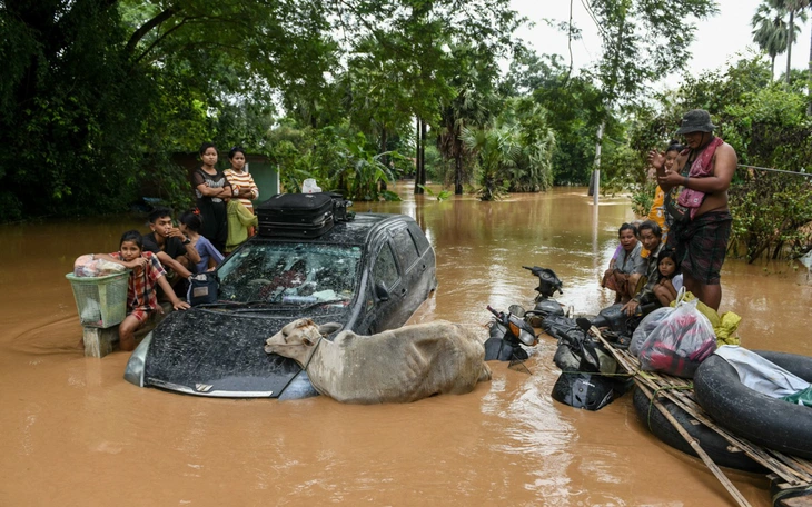 Ngập lụt tại Đông Bắc Thái Lan do mưa lớn và nước sông Mekong dâng cao - Ảnh 5.