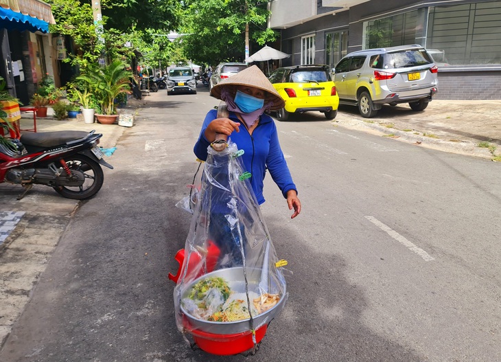 Quang gánh giữa thành phố - Ảnh 3.