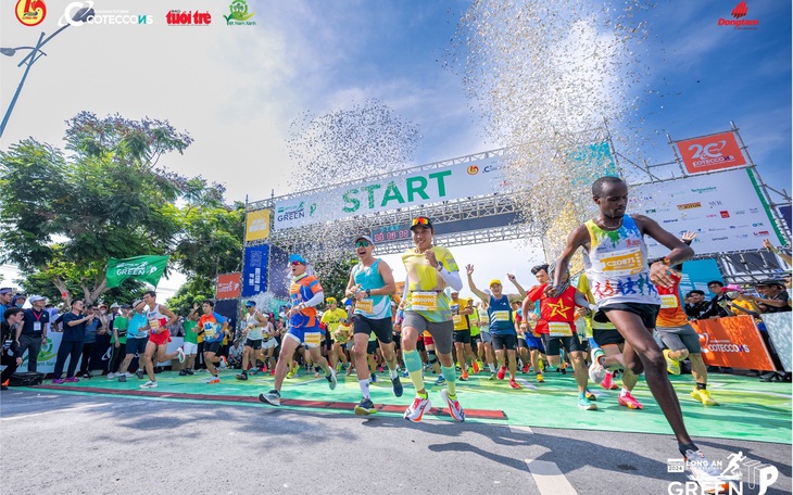 Khai mạc giải Marathon đất sen hồng dưới trời mưa   - Ảnh 4.