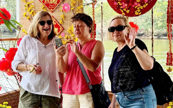 Tây trải nghiệm Tết miền Tây - Ảnh 11.