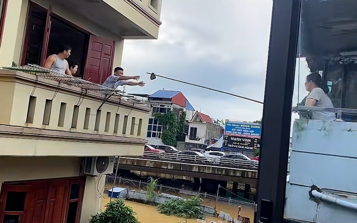 Gượng dậy sau bão lũ - Ảnh 13.