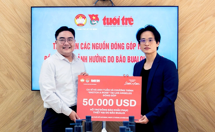 Ca sĩ Hà Anh Tuấn trao 50.000 USD ủng hộ người dân bị thiệt hại do cơn bão Bualoi - Ảnh 1.