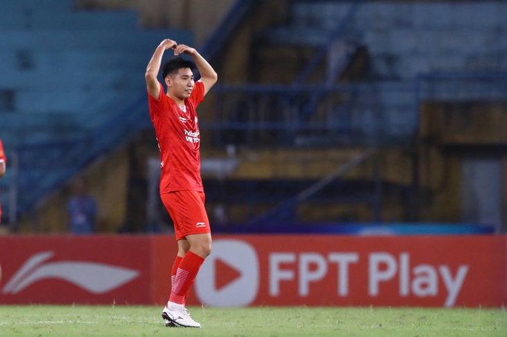 đinh xuân tiến - Ảnh 1.