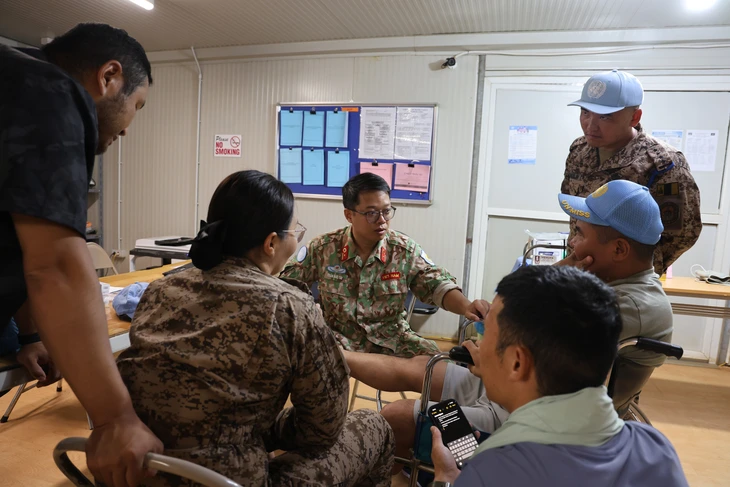 Bệnh viện dã chiến cấp 2 số 7 phẫu thuật thành công nối gân gót chân đầu tiên tại Nam Sudan - Ảnh 3.