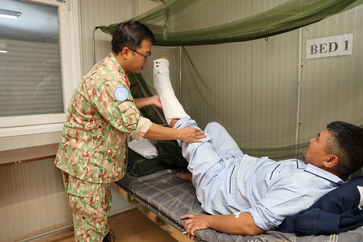 Bệnh viện dã chiến cấp 2 số 7 phẫu thuật thành công nối gân gót chân đầu tiên tại Nam Sudan - Ảnh 4.