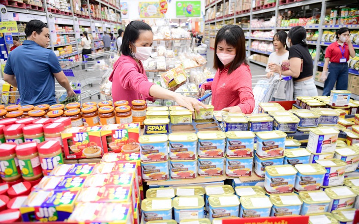 Doanh nghiệp sản xuất, bán lẻ nỗ lực giữ giá mùa Tết - Ảnh 3.