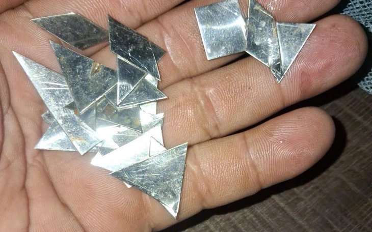 Xác minh người đàn ông rải đinh nhọn trên đường Nguyễn Kiệm, TP.HCM - Ảnh 2.