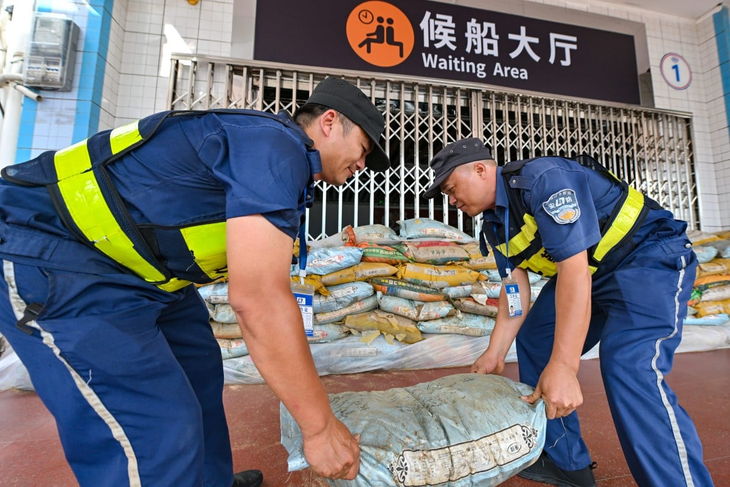 Hàng trăm ngàn người sơ tán vì bão Matmo đổ bộ miền nam Trung Quốc - Ảnh 1.