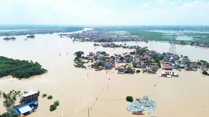 Lũ trên sông Cầu qua Hà Nội, Bắc Ninh đang lên, dự báo ngập lụt kéo dài 2-4 ngày - Ảnh 1.