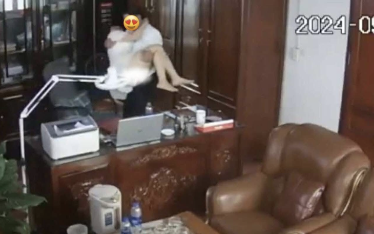 Công an xác minh clip người đàn ông 'thân mật' với phụ nữ trong phòng làm việc - Ảnh 2.