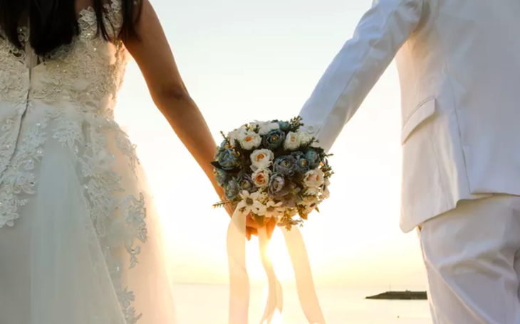 Mùa tổng động viên cưới - Ảnh 2.