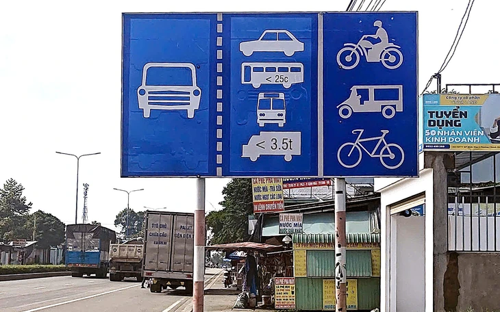 Ngày đầu tách làn đường Mỹ Phước - Tân Vạn, người dân ủng hộ vì 'đỡ lo tai nạn' - Ảnh 5.