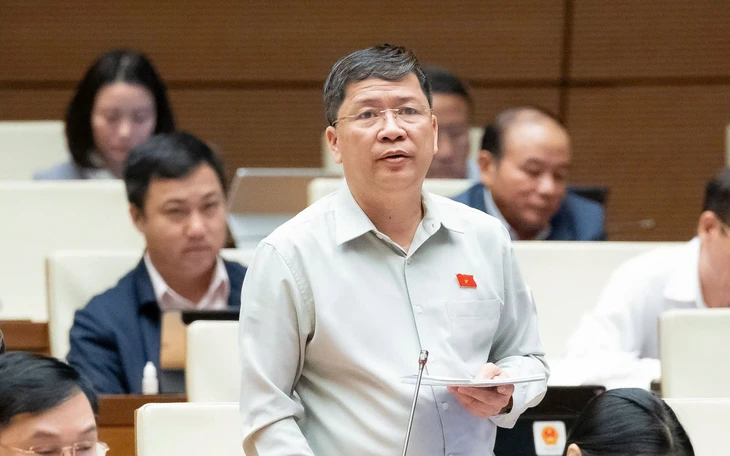 Bộ trưởng Bộ Xây dựng Trần Hồng Minh nói về đề xuất bỏ giấy phép xây dựng nhà dưới 7 tầng - Ảnh 2.