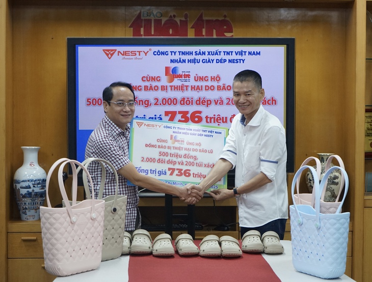 Nhãn hiệu Nesty đóng góp gần 740 triệu đồng tiếp sức bà con vùng lũ - Ảnh 1.