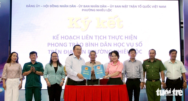 Phường Nhiêu Lộc, TP.HCM đưa chuyển đổi số đến từng người, phòng lừa đảo qua mạng - Ảnh 1.