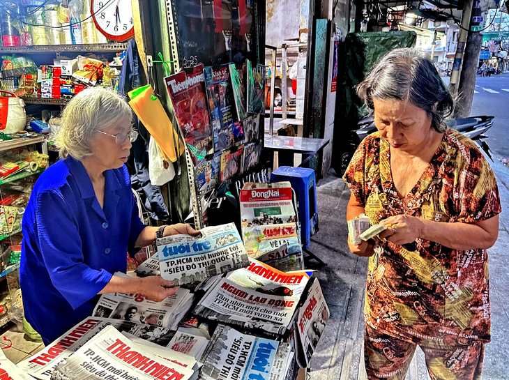 Luật hóa quy định về thu phí khác với quy định buộc trả phí khi đọc báo - Ảnh 1.