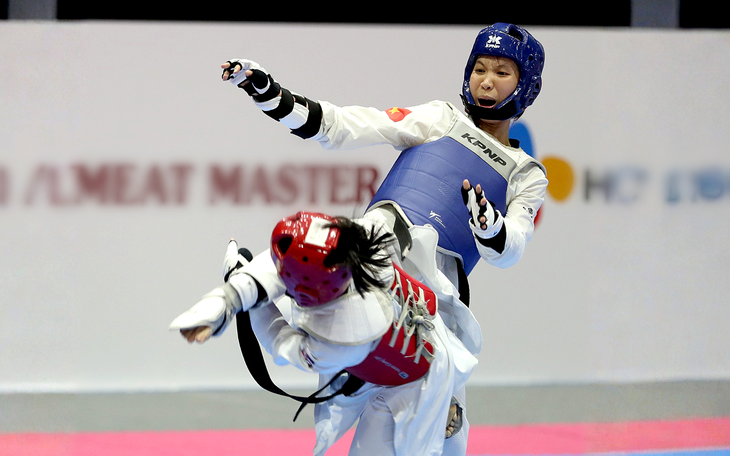 Ông Trương Ngọc Để được phong 9 đẳng huyền đai taekwondo - Ảnh 3.