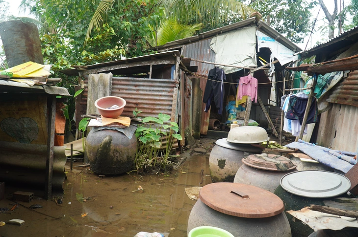 Người nhà kể lại khoảnh khắc phát hiện hai mẹ con bị điện giật trong ngôi nhà ngập nước - Ảnh 4.