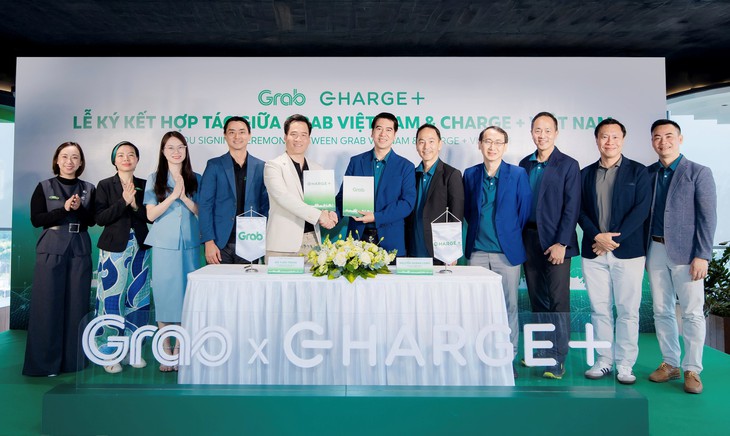 Grab Việt Nam và Charge+ hợp tác phát triển mạng lưới trạm sạc - Ảnh 1.