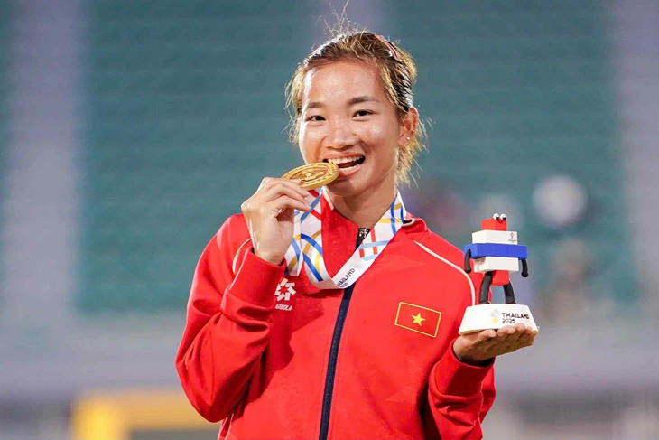 Điền kinh và các môn võ 'tỏa sáng' giúp Việt Nam chạm mốc 30 HCV ở SEA Games 33 - Ảnh 1.