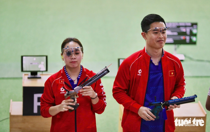 Xạ thủ Trịnh Thu Vinh hụt hat-trick vàng ở SEA Games 33 - Ảnh 1.