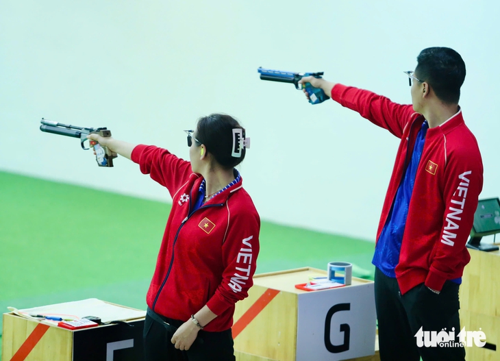 Xạ thủ Trịnh Thu Vinh hụt hat-trick vàng ở SEA Games 33 - Ảnh 2.