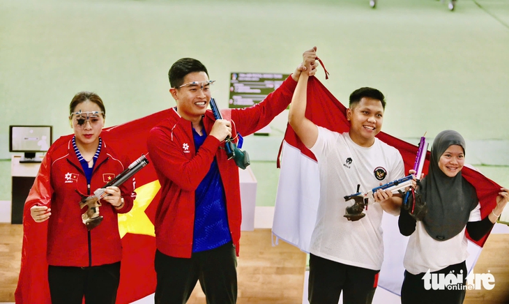 Xạ thủ Trịnh Thu Vinh hụt hat-trick vàng ở SEA Games 33 - Ảnh 3.