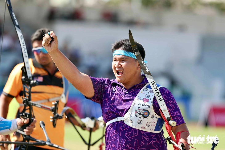 Đứng bắn giữa nắng chiều 32 độ C, cung thủ Việt Nam vào tranh HCV - Ảnh 5.