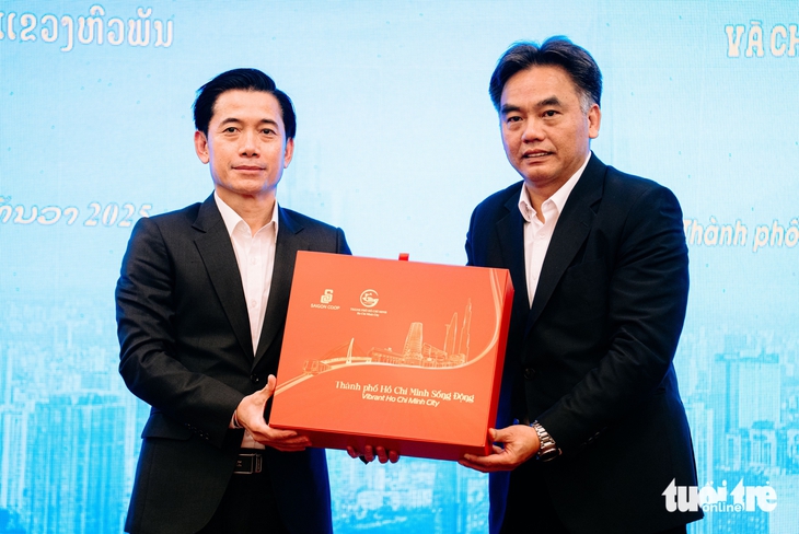TP.HCM chia sẻ kinh nghiệm phát triển với tỉnh Houaphanh của Lào - Ảnh 5.