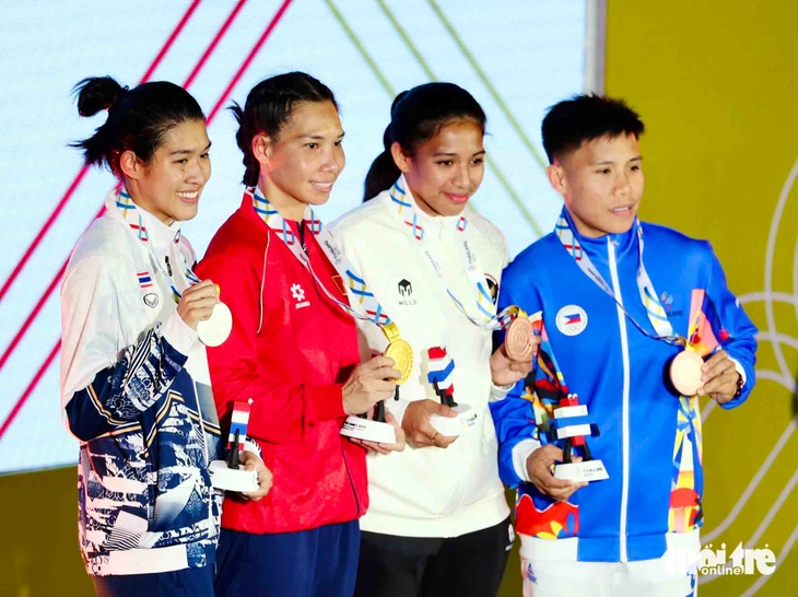 Bà mẹ hai con giành HCV boxing SEA Games 33 để mua sữa cho con - Ảnh 1.