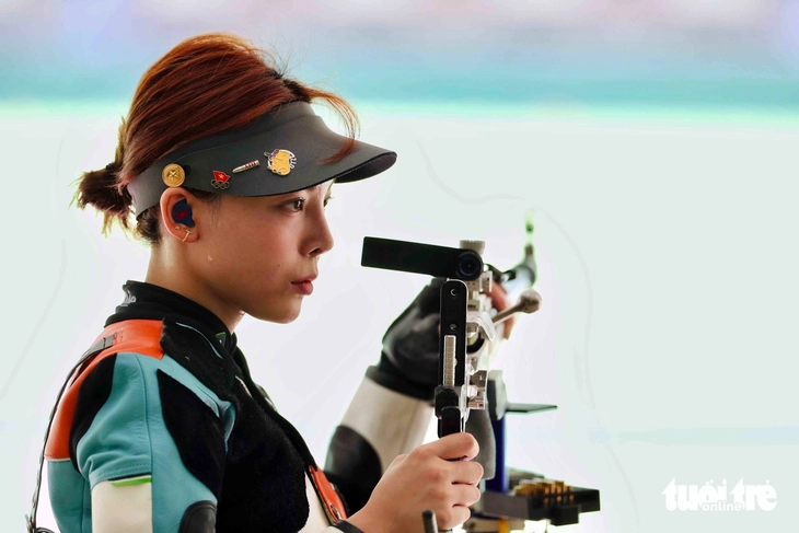 Ngắm bộ ảnh 'hoa khôi bắn súng' Phí Thanh Thảo tại SEA Games 33 - Ảnh 4.