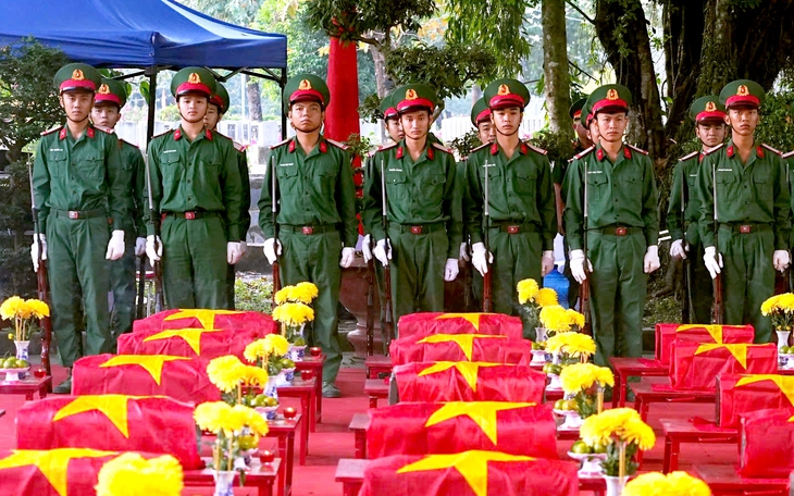 Phát hiện hài cốt liệt sĩ cùng lọ thủy tinh có tên NGUYỄN MINH THUẬN - Ảnh 4.