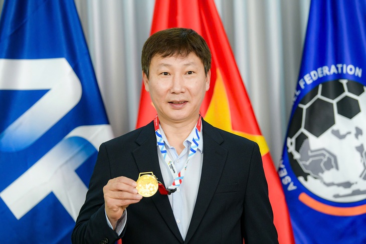 Kim Sang Sik - Ảnh 2.