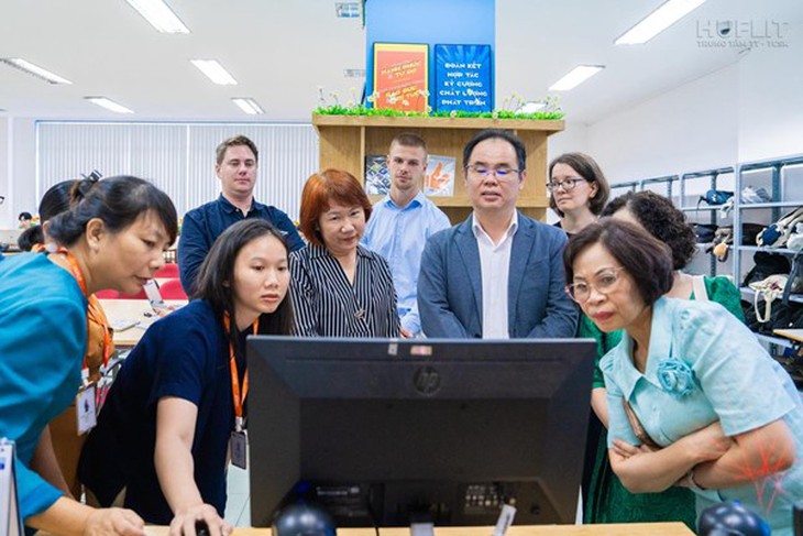 Dấu mốc cho hành trình vươn mình ra khơi của HUFLIT - Ảnh 3.