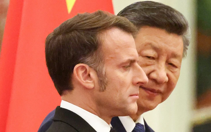 Ông Macron đến Trung Quốc, dọa đánh thuế quan kiểu Mỹ - Ảnh 2.