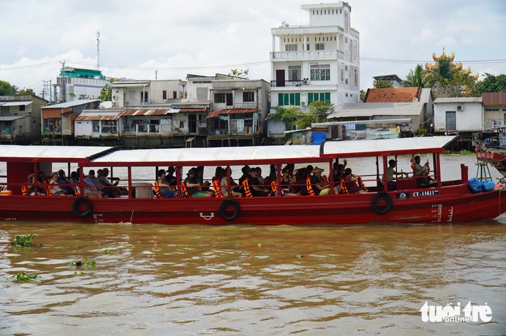 Đồng Tháp tái hiện chợ nổi Cái Bè: Gợi nhớ một thời thương hồ tấp nập - Ảnh 4.