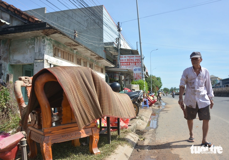 Nước lũ vẫn ngập sâu nhiều vùng Bình Thuận cũ - Ảnh 9.