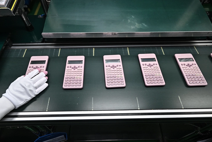 máy tính cầm tay - Ảnh 2.