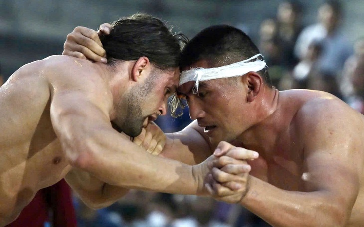 Viva Vân bảo vệ đai đô vật Mỹ thành công ở Saigon Slam Jam - Ảnh 2.
