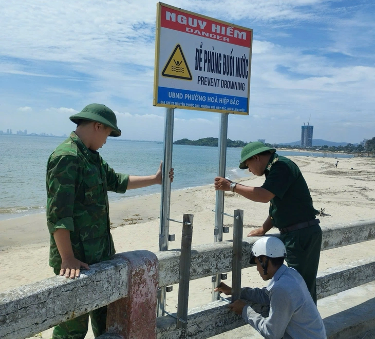 Cứu hai cậu cháu bị đuối nước khi tắm biển tại Đà Nẵng - Ảnh 3.