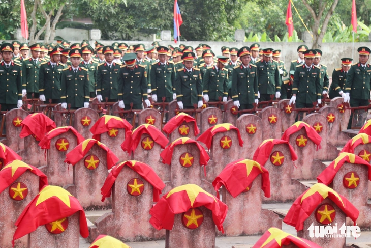 An táng 76 hài cốt liệt sĩ hy sinh ở Lào về đất mẹ - Ảnh 3.